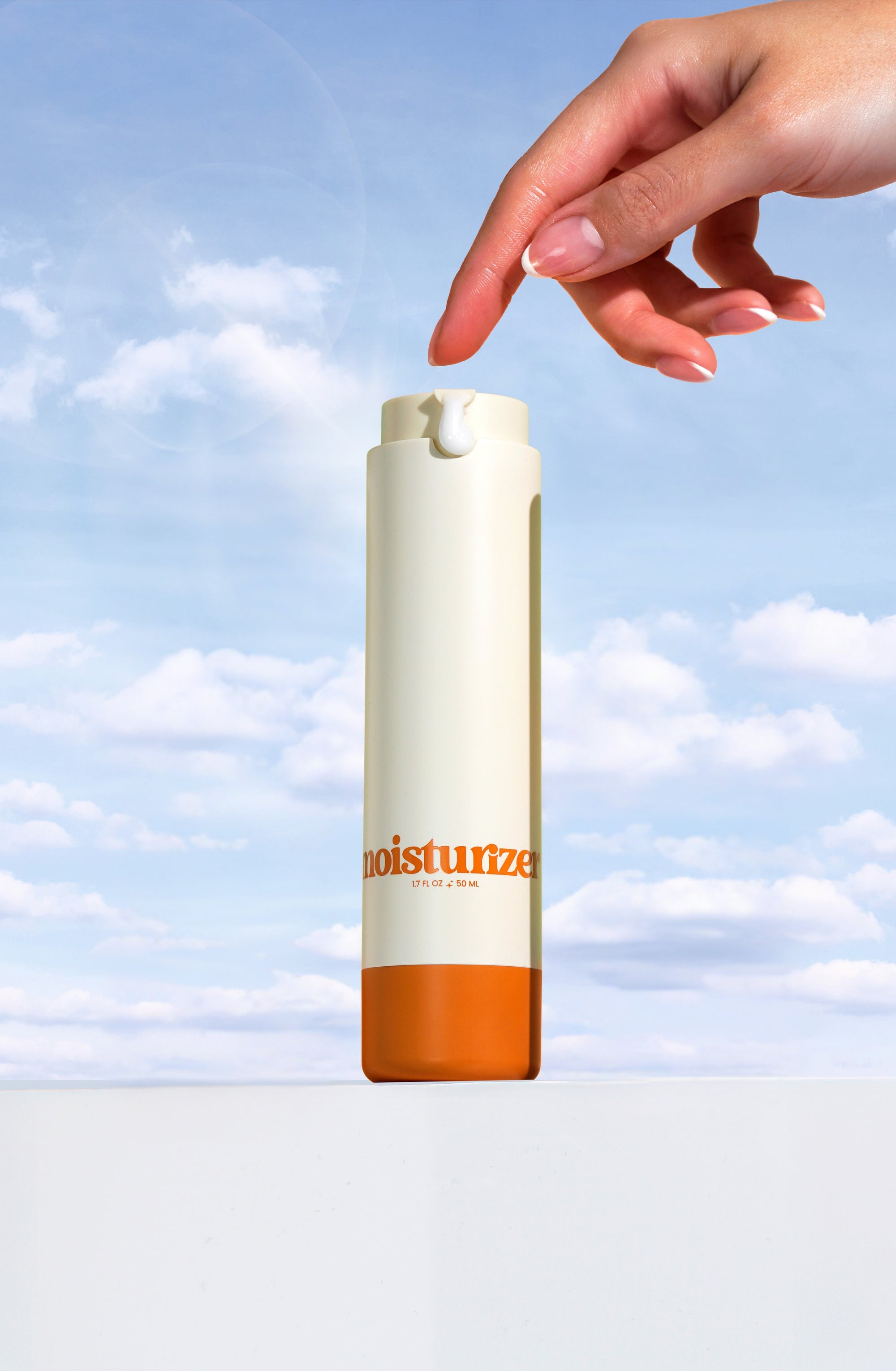 Image of a clean, minimalistic Girlyish Skincare Moisturizer bottle. The design features a modern layout with soft colors and simple typography, giving a fresh and professional appearance with a cloud background.